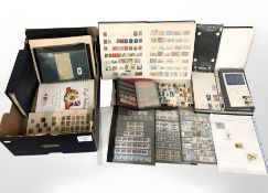 A box containing stamp albums, a file of first day covers, 20th century world stamps, etc.