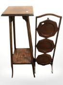 A mahogany three tier folding cake stand and a plant stand