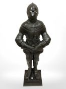 A cast iron knight companion stand, height 66 cm.