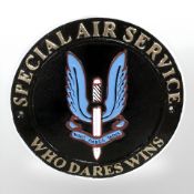 An SAS metal plaque.