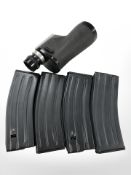 Four machine gun ammunition clips, together with an HGS scope.