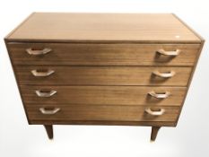 A mid 20th century G Plan teak four drawer chest, width 96 cm with matching mirrored dressing table,