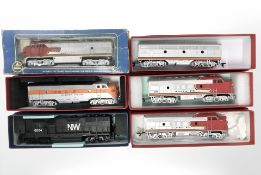 A group of six Bachmann HO scale model railway engines and tenders.