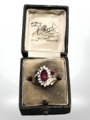 A 10ct yellow gold synthetic ruby and cubic zirconia ring, size N.