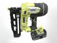 A Ryobi nailgun with battery.