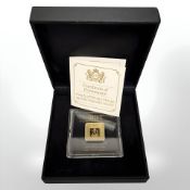 A CPM coins 2022 Platinum Jubilee 0.999 gold square ingot, with certificate of authenticity.