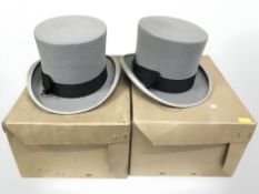 Two Dunn & Co. grey top hats.