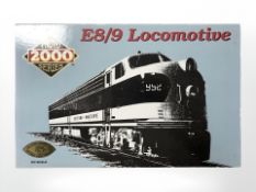 A Proto 2000 series HO scale E8-9 locomotive engine set.