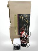 A sleigh rope light silhouette together with an inflatable shaking penguin and a Santa.