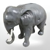 A metal elephant money box.