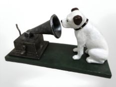A cast iron HMV dog with gramophone.