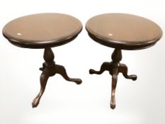 A pair of Victorian style mahogany occasional tables, diameter 61 cm.