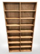 A pair of beech open bookcases,