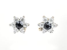 A pair of 9ct yellow gold synthetic sapphire cluster earrings.