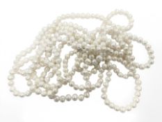 Two long cultured pearl necklaces and a further pearl necklace.