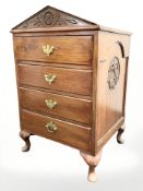 A reproduction mahogany four drawer chest,