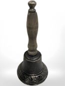 An antique style hand bell.