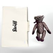 A Steiff LED bear, boxed.