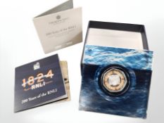 A Royal Mint 2024 silver proof 50p colour coin celebrating 200 years of the RNLI,