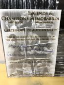 A signed pair of Tony Bellew boxing shorts, framed as a montage.