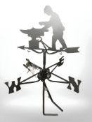 A blacksmith weather vane.