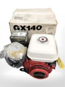 A Honda GX140 engine, boxed.