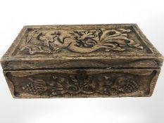 A carved oriental style wooden box containing threads, etc, width 50 cm.