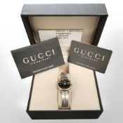 A lady's Gucci stainless steel wristwatch,