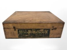 A vintage wooden printing box.