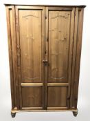 A pine double door wardrobe,