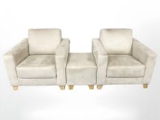 A pair of cream upholstered armchairs, together with the matching footstool.