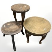 An Arts & Crafts two tier occasional table, height 46 cm,