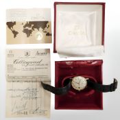 An Omega De Ville 9ct gold gent's wristwatch, on leather strap, with all the original paperwork,
