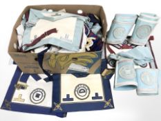 A box containing a quantity of Masonic regalia, apron sashes, Norfolk lodge, etc.