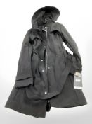 A black DKNY girls coat, size XS.