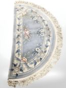 Four Chinese rugs to include two hearth rugs and two further on blue and green ground