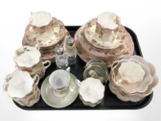 A tray of antique gilded floral tea china, pair of crystal salt and pepper sifters,