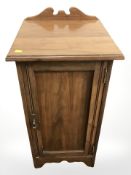 An Edwardian walnut pot cupboard,