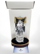 A Swarovski Collector's Society figure, Masquerade Columbine, on plinth,