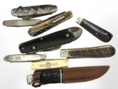 A group of vintage pen knives and a Scottish skein.