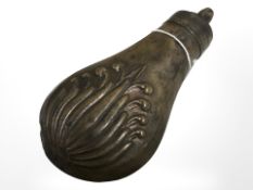 A 19th century copper powder flask.