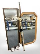 An antique rectangular mirror, together with two fishing rods and a further contemporary mirror.