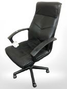 A black swivel office chair
