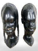*** Withdrawn *** Two carved hardwood African heads, height 31 cm.