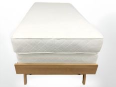 A 3ft truckle bed on beech frame, comprising two 3ft mattresses.