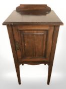 An Edwardian mahogany pot cupboard, width 40 cm, together with an antique chair.