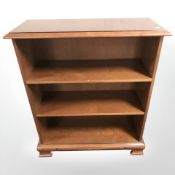A reproduction mahogany bookcase, width 80 cm.