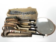 A group of mid 20th century tennis rackets, hockey stick, teak framed mirror,