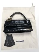 A Jacquemus lady's handbag, new with Harvey Nichols tag and retail soft cloth outer bag.