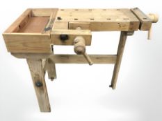 A child's pine work bench with vice